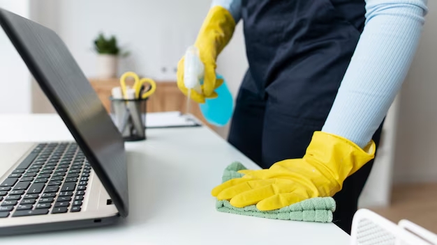 person-taking-care-office-cleaning_23-2149374450